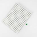 Molde para gomitas de media esfera de silicona de 2.8 mL - 192 cavidades - vista diagonal, de silicona, con muestras de gomitas verde esmeralda